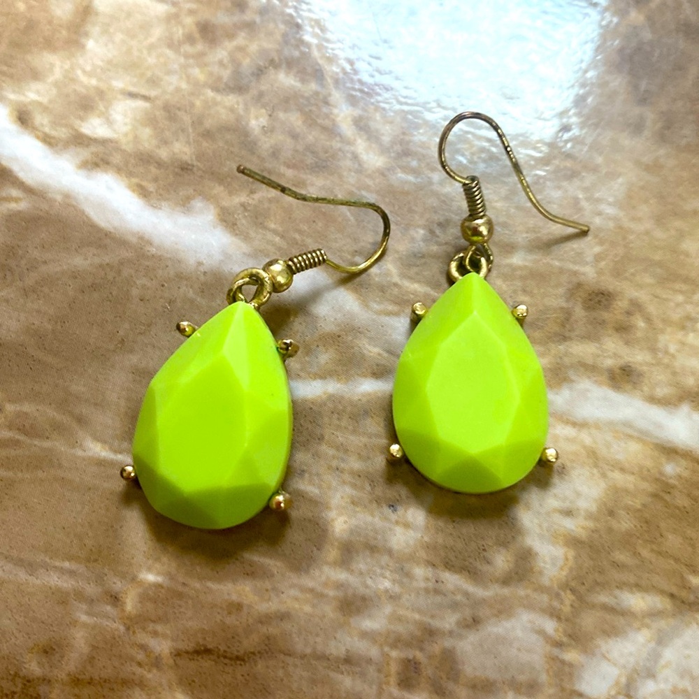 Used green earring drop